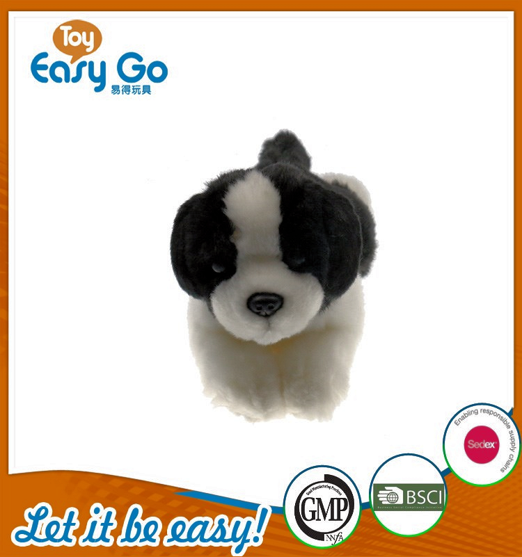 BSCI hot sale stuffed black and white laying dog 